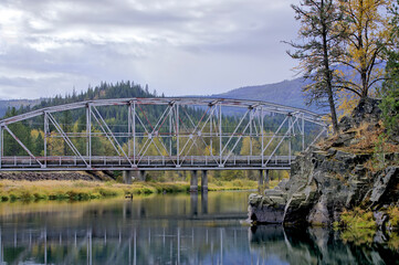 Fototapeta premium Bridge across the Coeur d'Alene River in Cataldo, Idaho.