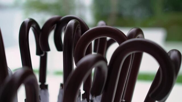 A lot of white umbrellas at the party reception or wedding. High quality FullHD footage