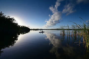 Woman kayaking on Nine Mile Pond in Everglades National Park, Florida.