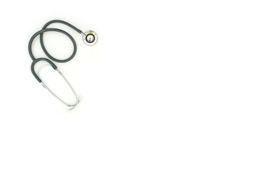 Hospital, clinic, healthcare and medical concept. Stethoscope on white background with copy space for text insert. Stethoscope for doctor in a hospital.