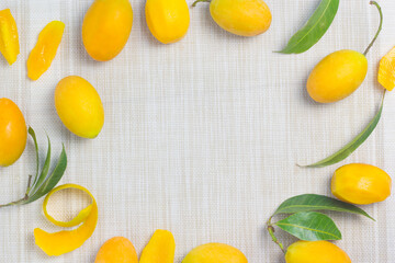 Maprang Yellow orange fruit With a sweet and sour taste mixed with appetizing, spread on the cloth floor