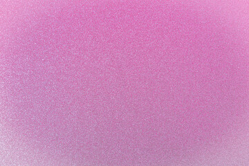 Abstract defocused pink glitter texture background with copy space for text or lettering. Minimal gradient composition. Mock up, festive background.