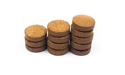 Abstract Coco fibre pellets for rapid plant growth isolated against white background.