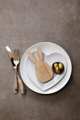 Traditional easter spring meal background. Table setting with bunny and eggs