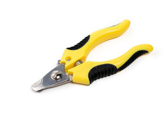 Dog nail trimmer, closed. Yellow black scissor style clipper with two stainless steel blades. Used by groomers and pet owners to keep dog claws short and healthy. Isolated on white. Selective focus.