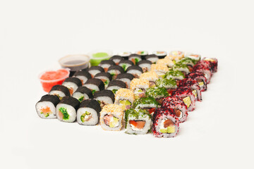 Set of rolls. Many different rolls. Japanese food.Chinese food. Sushi. Sushi of different colors.
