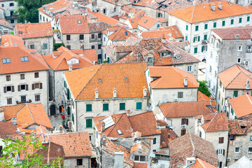 Fototapeta na wymiar Terracotta tiled rooftops viewed from above the Old Town,Kotor,Montenegro.