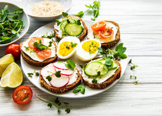 Sandwiches with healthy vegetables and micro greens