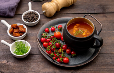 Homemade tomato soup with tomatoes, herbs, and spices. 