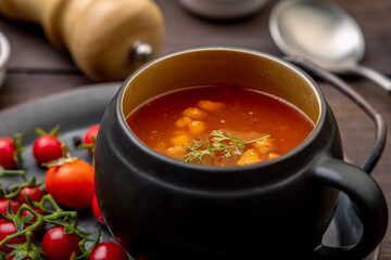 Homemade tomato soup with tomatoes, herbs, and spices. 