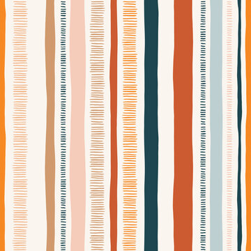 Hand-drawn whimsical textured organic vertical lines and stripes vector seamless pattern. Doodle folk abstract geometric print in bright colors. Marks, scribbles. Perfect for home decor
