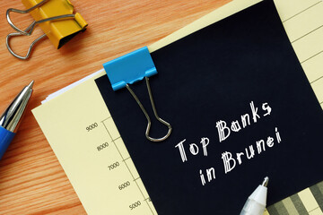  Financial concept about Top Banks in Brunei with phrase on the sheet.