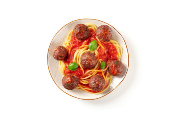 Meatballs with pasta, tomato sauce and basil, shot from above