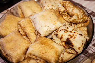 Appetite, delicious pancakes on a plate close-up.