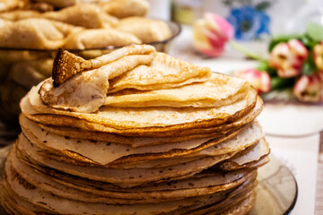 Appetite, delicious pancakes on a plate close-up.