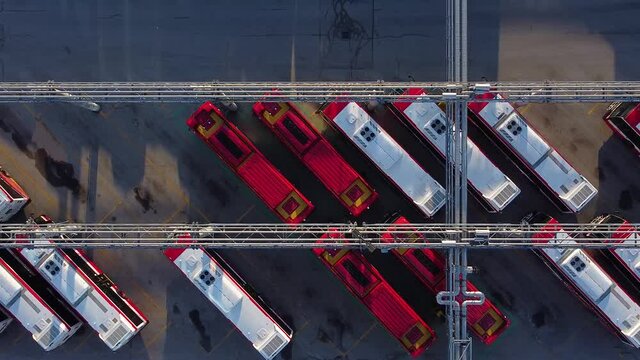 TTC public transit buses at large operations, maintenance and storage facility top down zoom out; aerial
