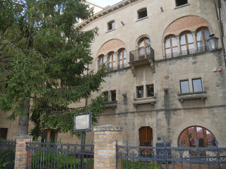 Fototapeta na wymiar San Marino, University Palace. The facade of the University palace with its garden.