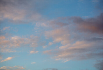 Rain clouds in the sky at sunset