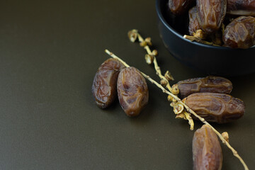 Kurma or Dates fruits, popular sunnah food in Ramadan month for breakfasting. Islamic background for text and template. Ramadan Kareem, Eid Mubarak celebration. 