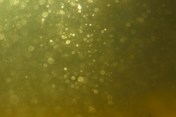 Abstract glitter gold bokeh