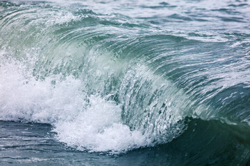 Fototapeta premium Wave in the sea with splashing water.