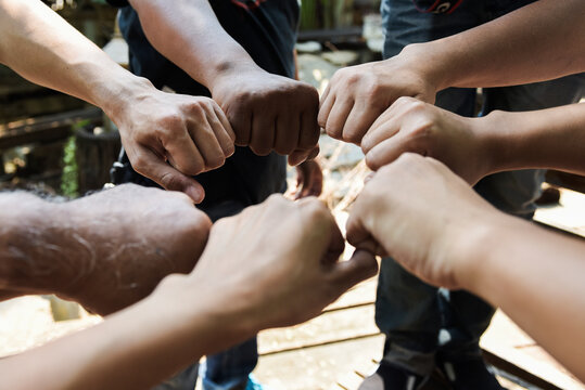 Business group United Hands together Joining teamwork