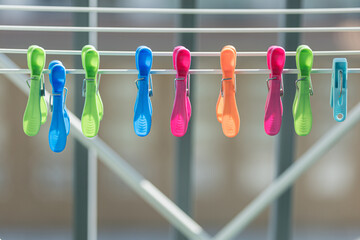Plastic clothespin on outdoor clothesline