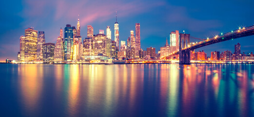 Panorama of Manhattan midtown at dusk with skyscrapers, New York City