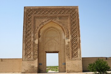 Fototapeta na wymiar Ribati Melik Caravanserai was built in the 11th century during the Karakhanid period. Only the door of the caravanserai remained intact. Navoiy, Uzbekistan.