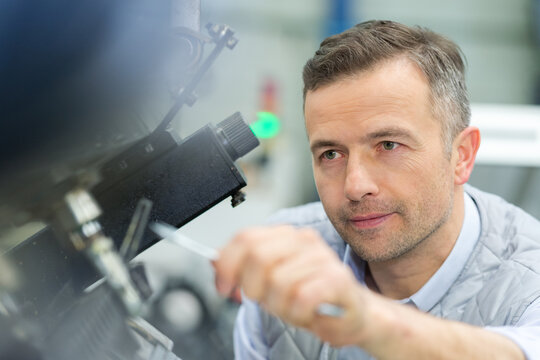 fashion designer measuring a dummy