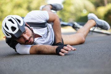 cyclist fallen from his bike