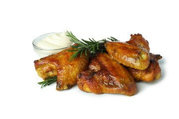 Baked chicken wings with rosemary and sauce isolated on white background