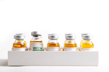 Looped. Flasks of vaccine for COVID-19 coronavirus in research lab. Vaccination, injection, clinical trial during pandemic, macro