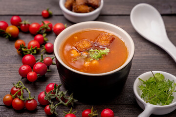 Homemade tomato soup with tomatoes, herbs and spices