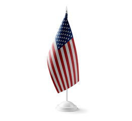 Small national flag of the United States on a white background