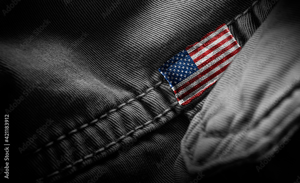 Wall mural tag on dark clothing in the form of the flag of the united states of america