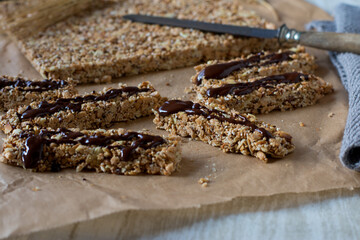 close up of a homemade no bake granola bar with chocolate