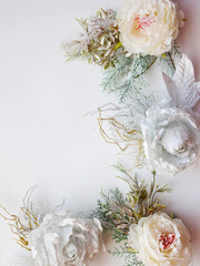 Artificial flowers background. Artificial flowers peonies and roses on a white background, place...