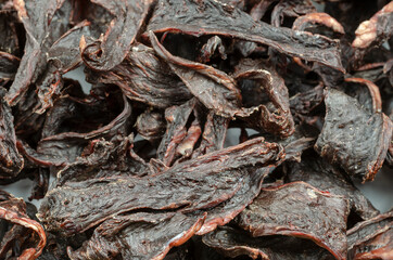 Helpful treats for pets. Close-up Pieces of stewed beef heart.