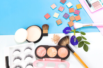 The colors of Professional set for make-up. Makeup palette with makeup brushon