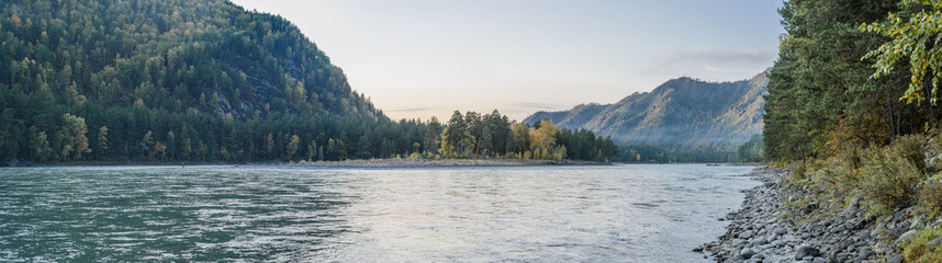 Morning at the mountains among river, sand and trees. Relax among nature