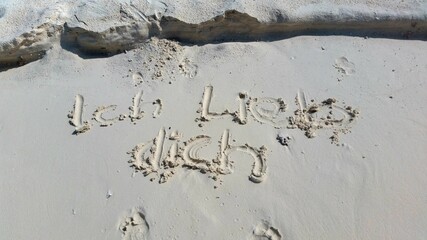 Love you text on the beach