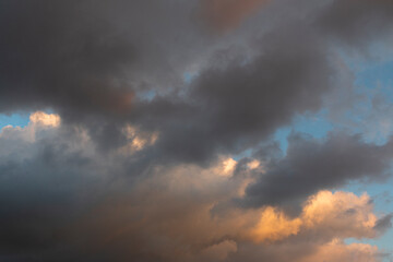 Naklejka na ściany i meble Sky with storm clouds at sunset