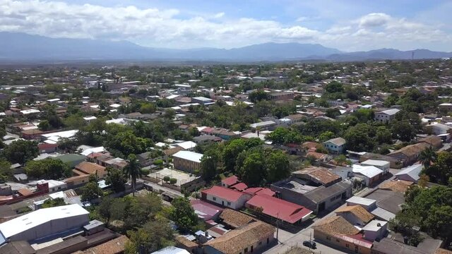 Drone shot of a town in Honduras with houses, urban and rural area