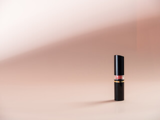 Closed lipstick on a powdery background