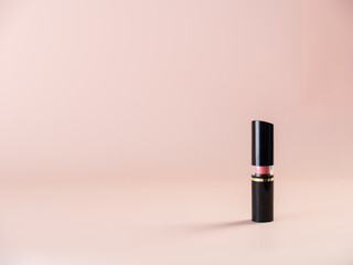 Closed lipstick on a powdery background