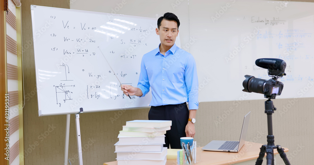 Wall mural male physical teacher teach online