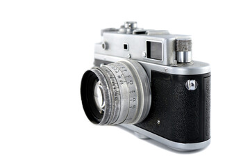 Classic film camera. Old chrome camera on a white background.