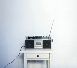 Retro Radio Cassette on a white table - 421198593