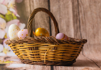 Eggs in a rústic basket. Easter egg
